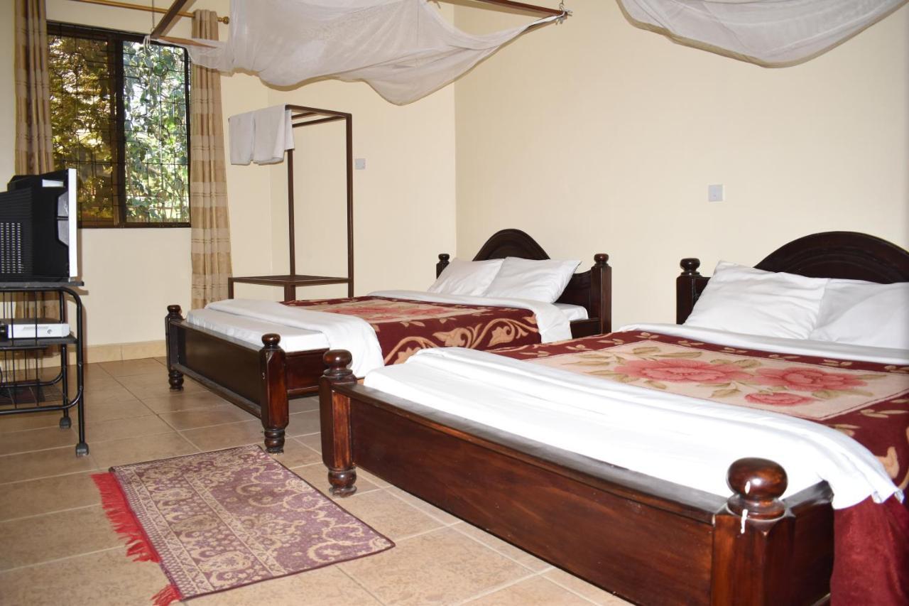 Rainbow Executive Lodge Boma la Ngombe Екстер'єр фото